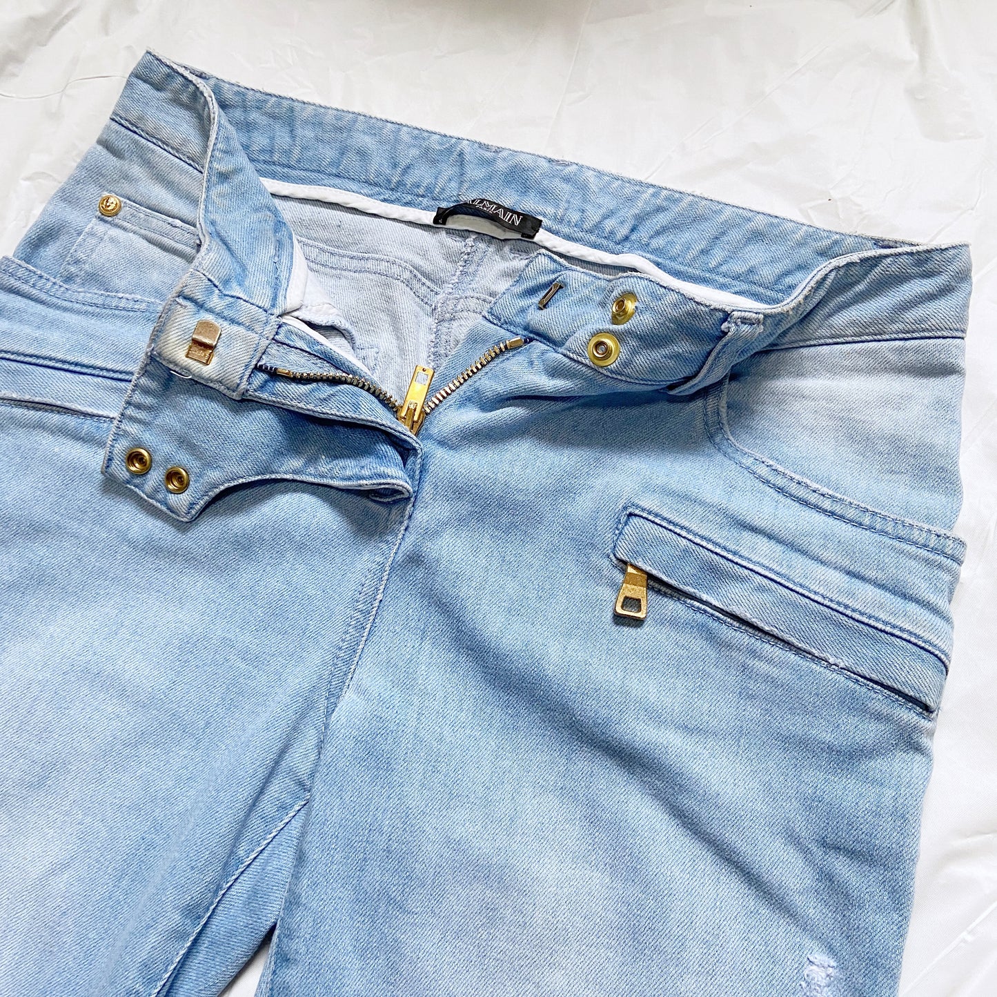 Balmain Spring 2009 Decarnin era distressed light blue gold zipper jeans