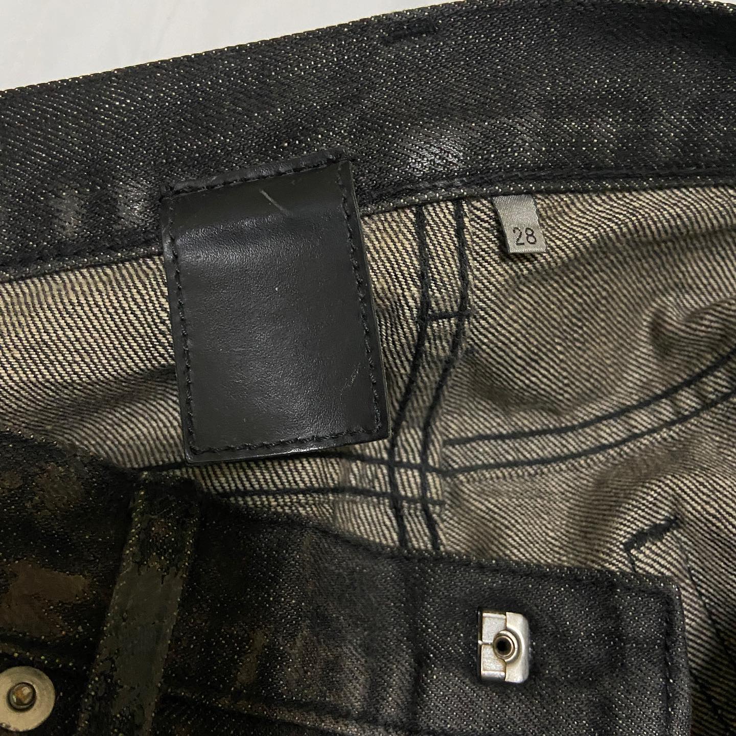 Dior homme “Luster” burnt waxed clawmark denim jeans 28