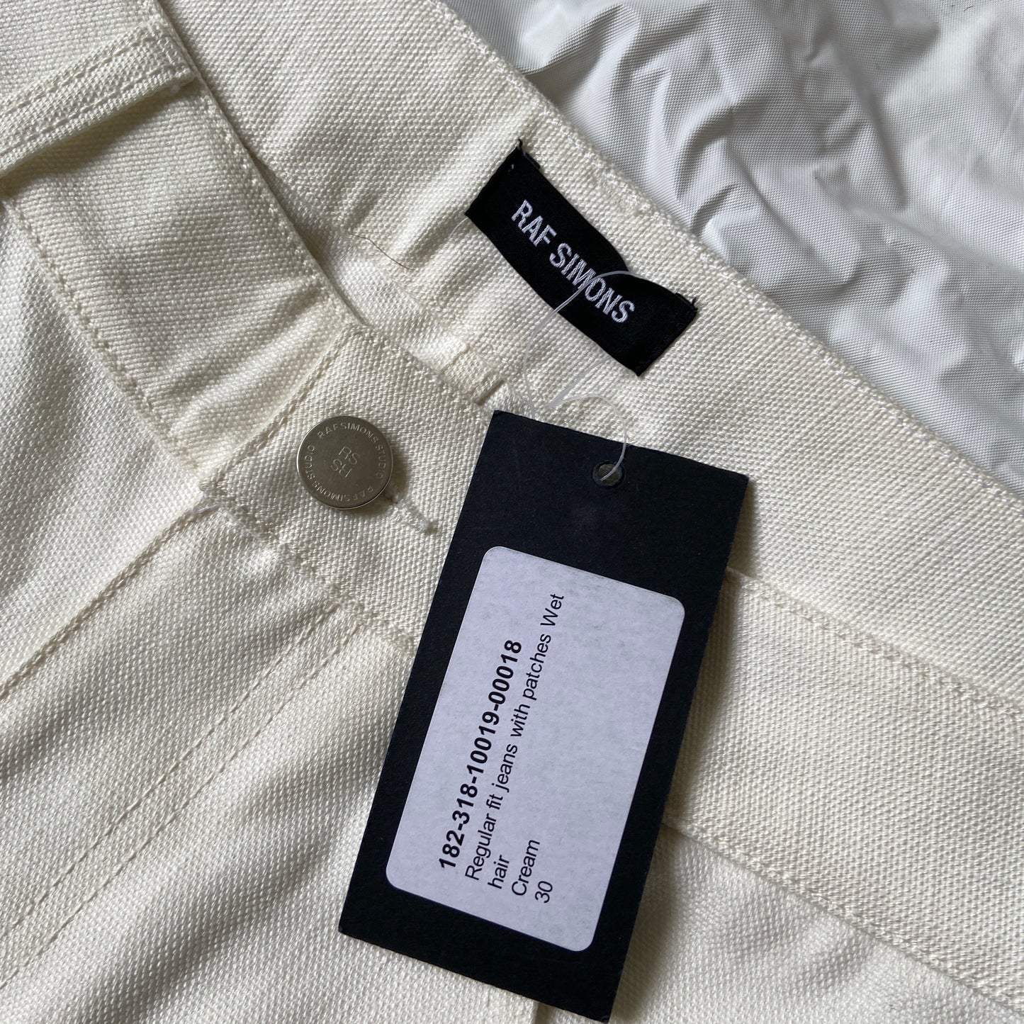 Raf Simons aw18 cream Christian f. jeans with wet hair 30