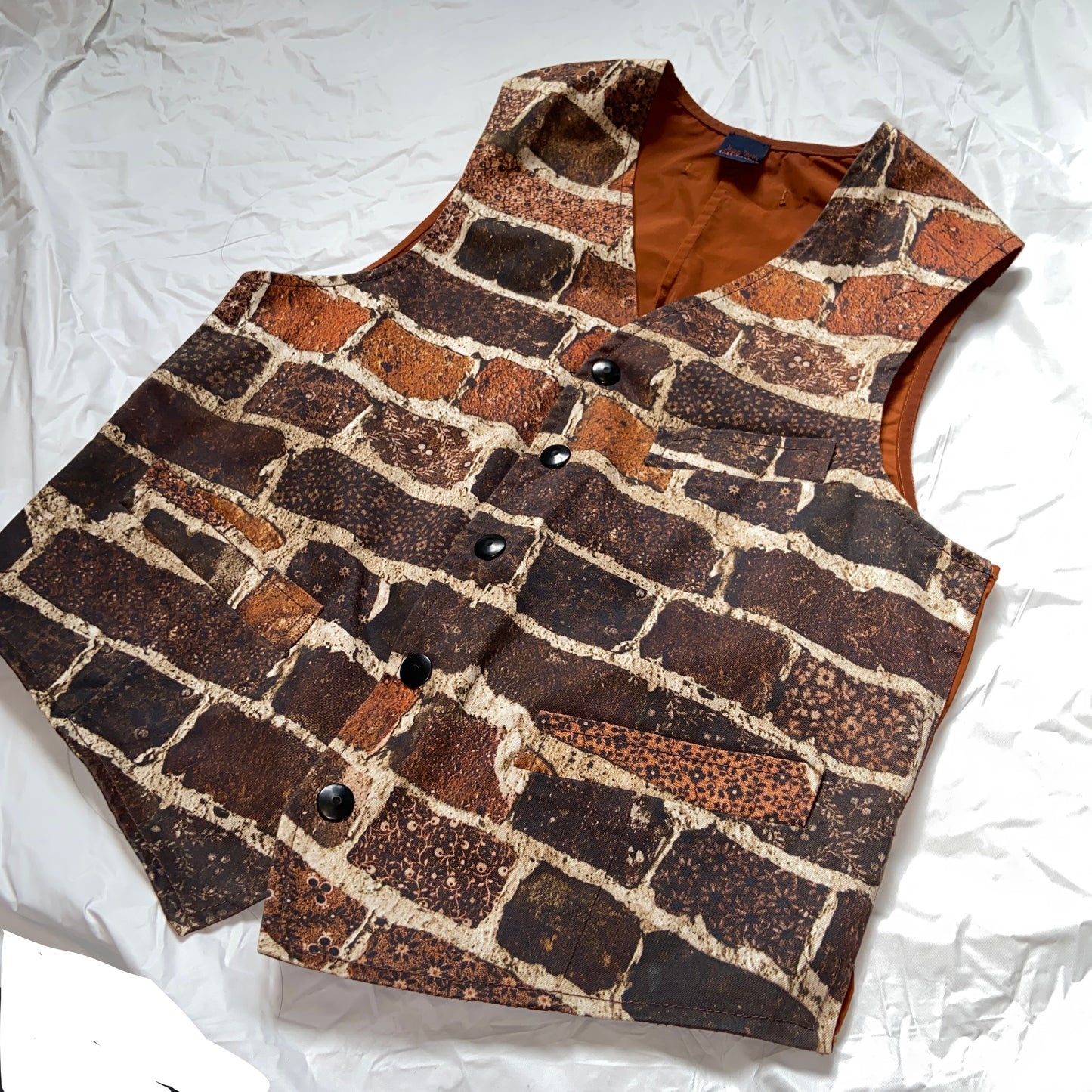 Jean paul Gaultier fw12 show-opening brick wall vest