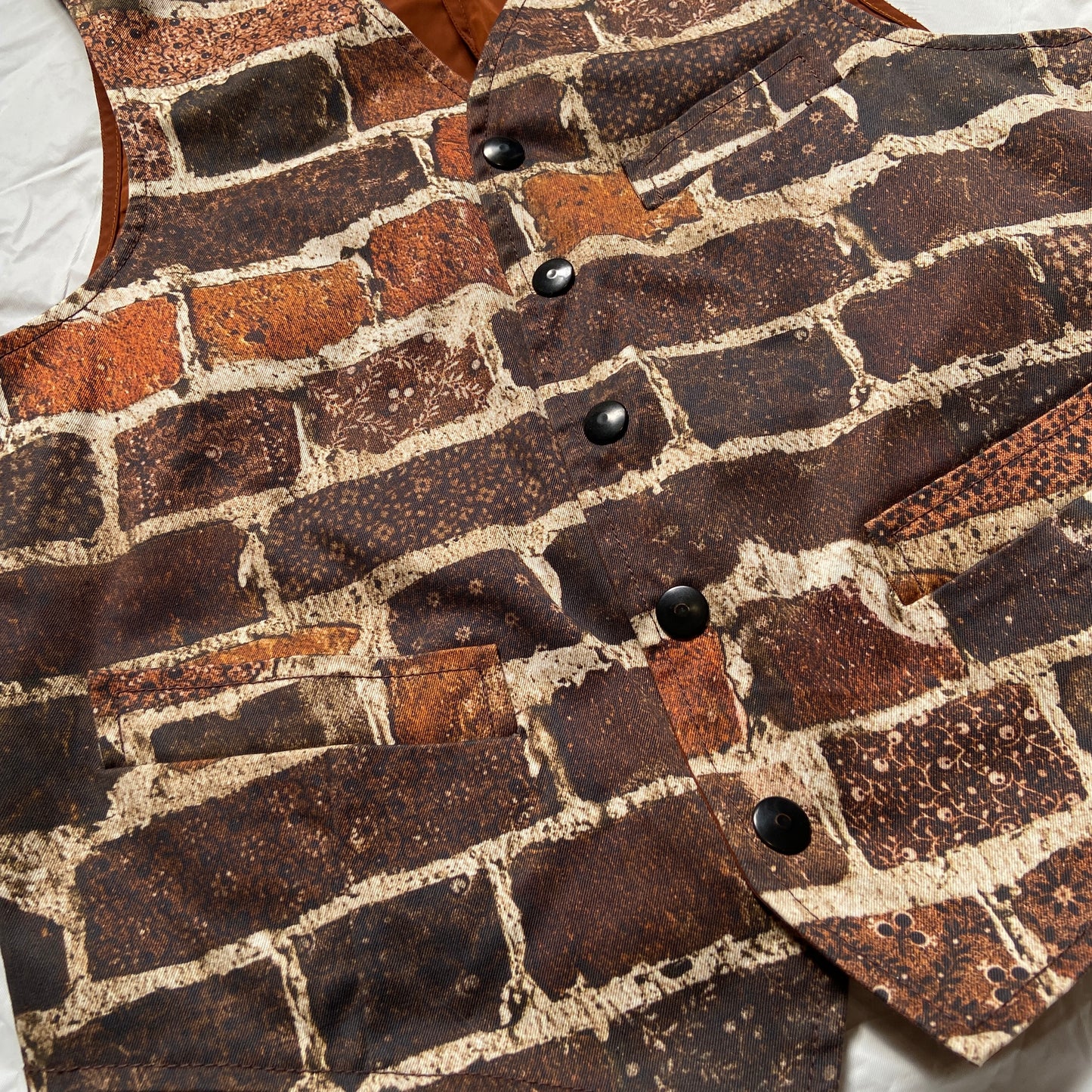 Jean paul Gaultier fw12 show-opening brick wall vest