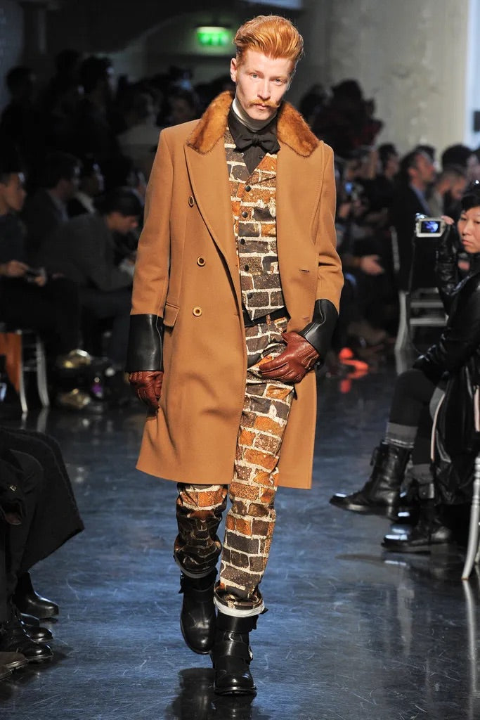 Jean paul Gaultier fw12 show-opening brick wall vest