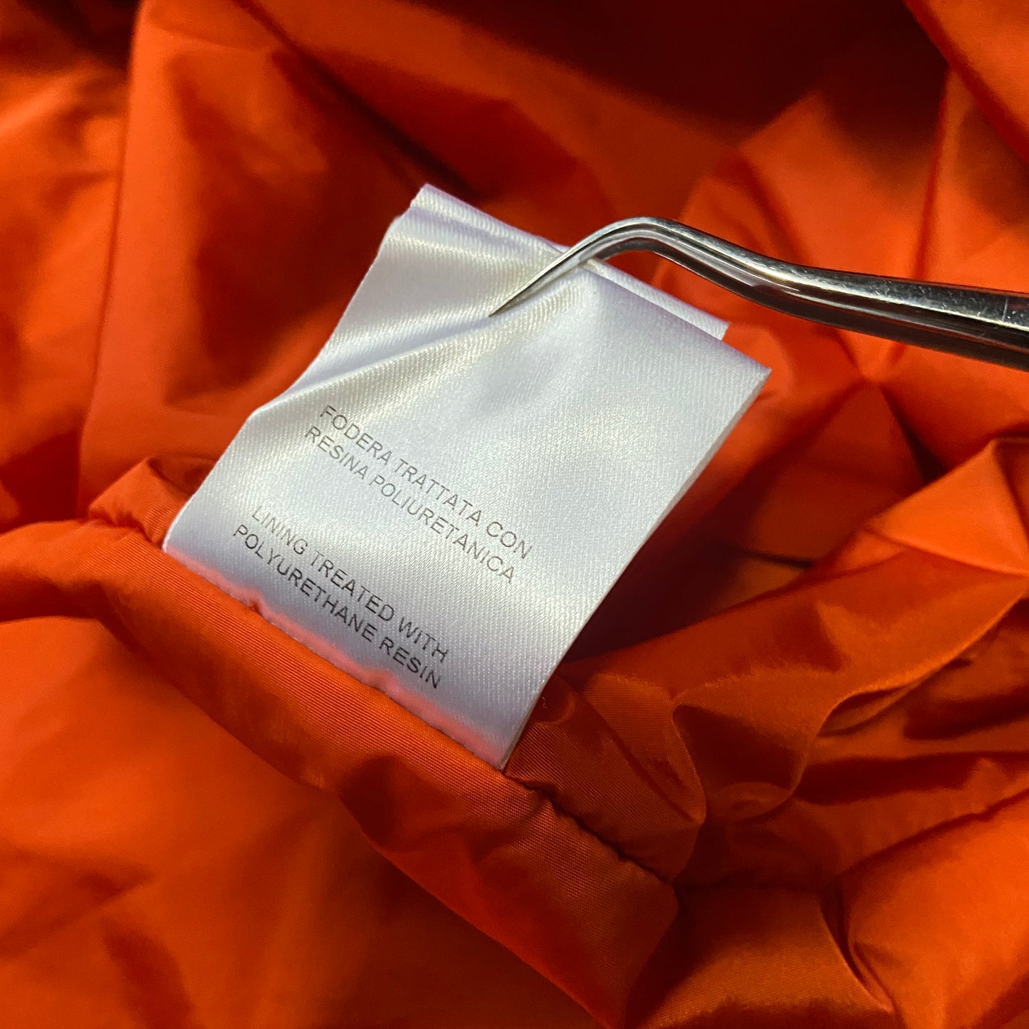 Gucci orange monogram puffer jacket