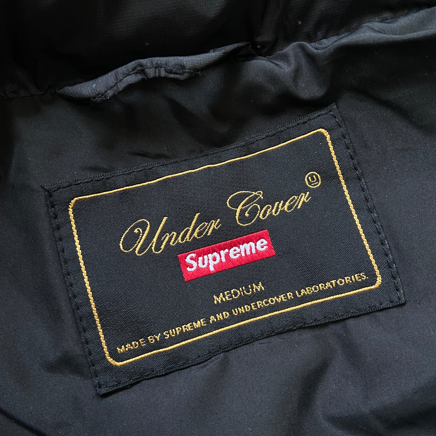 Undercover Supreme public enemy puffer jacket M