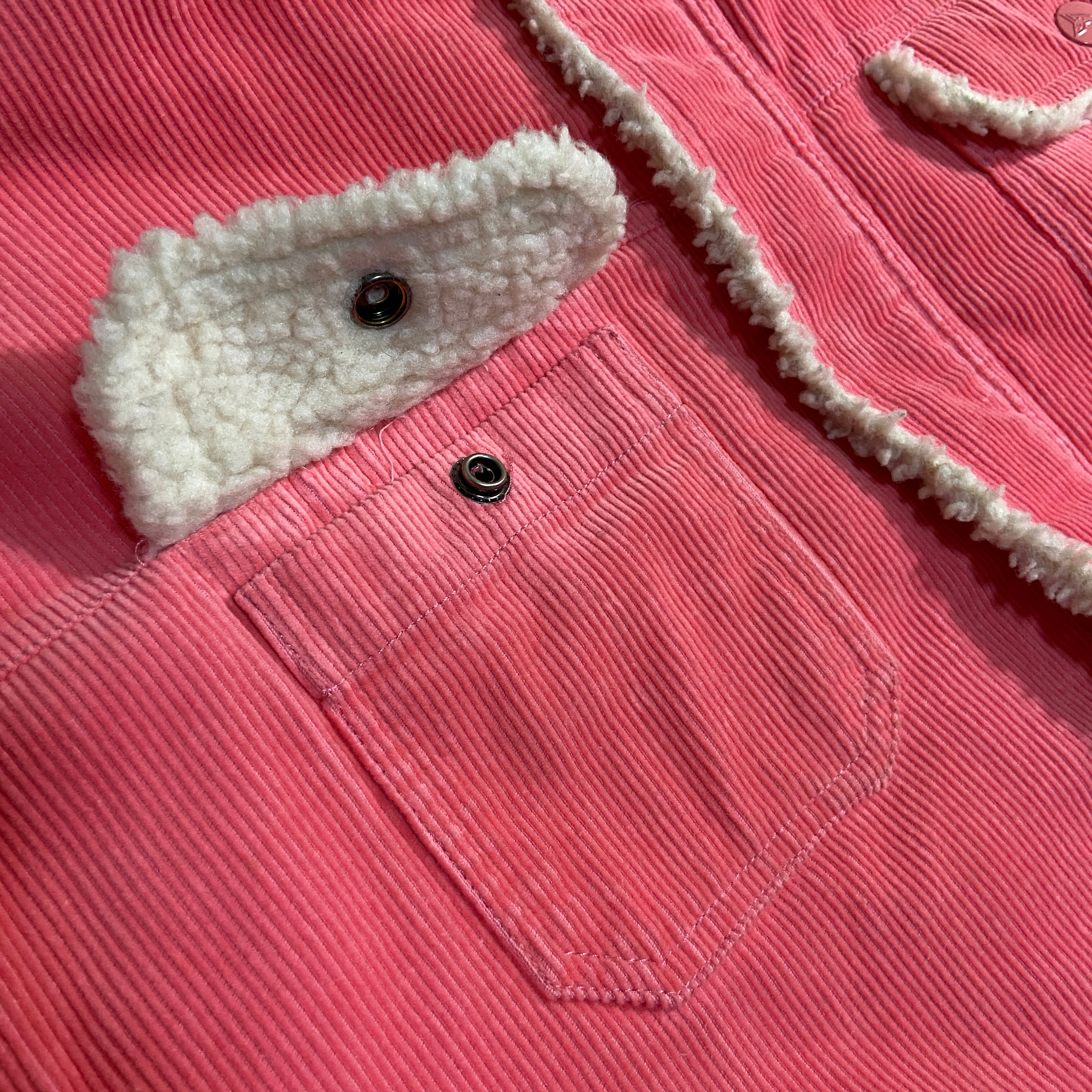 Pink corduroy jacket with clearance fur