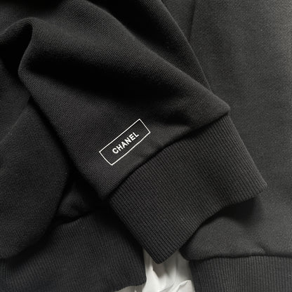 Chanel black uniform logo sweater L