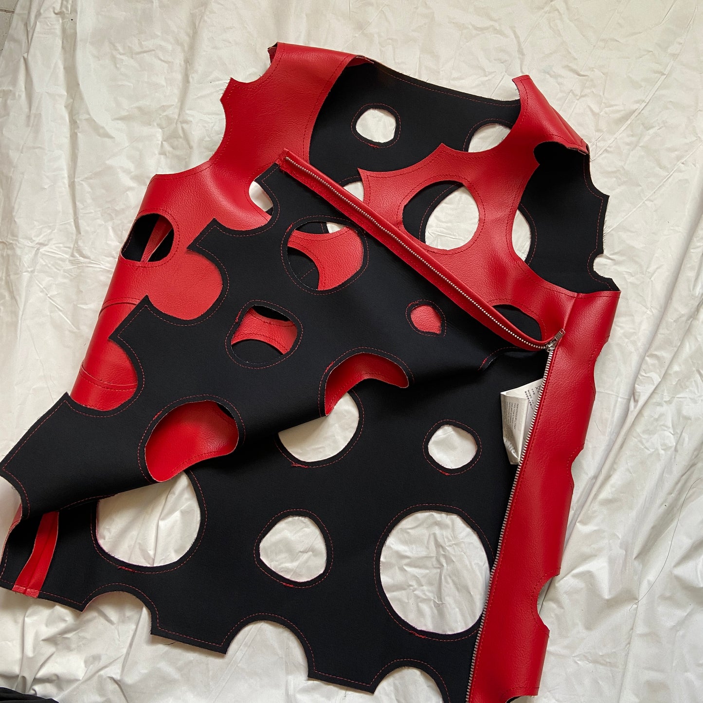 Comme des Garçons red leather circle cut-out tank vest