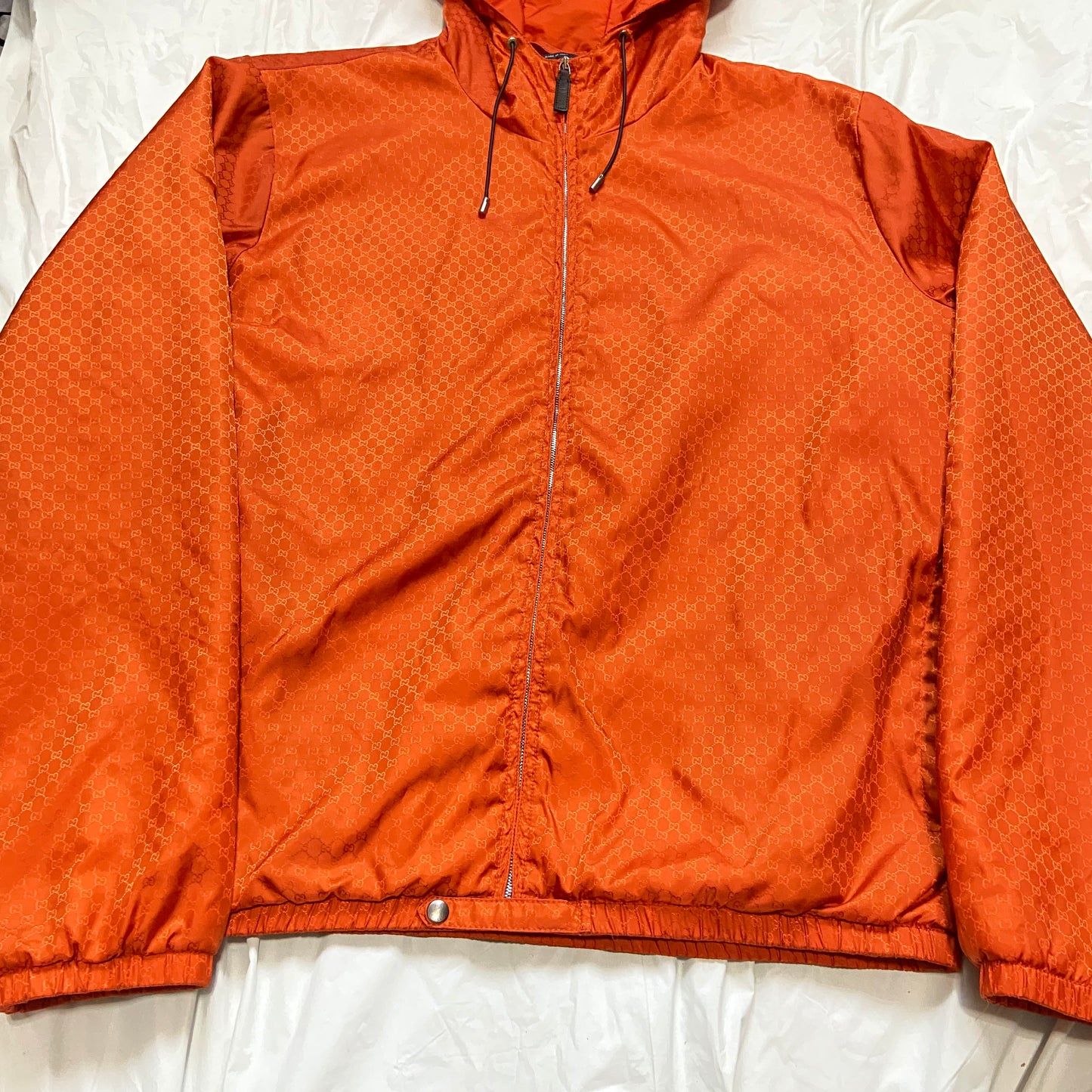 Gucci orange monogram puffer jacket