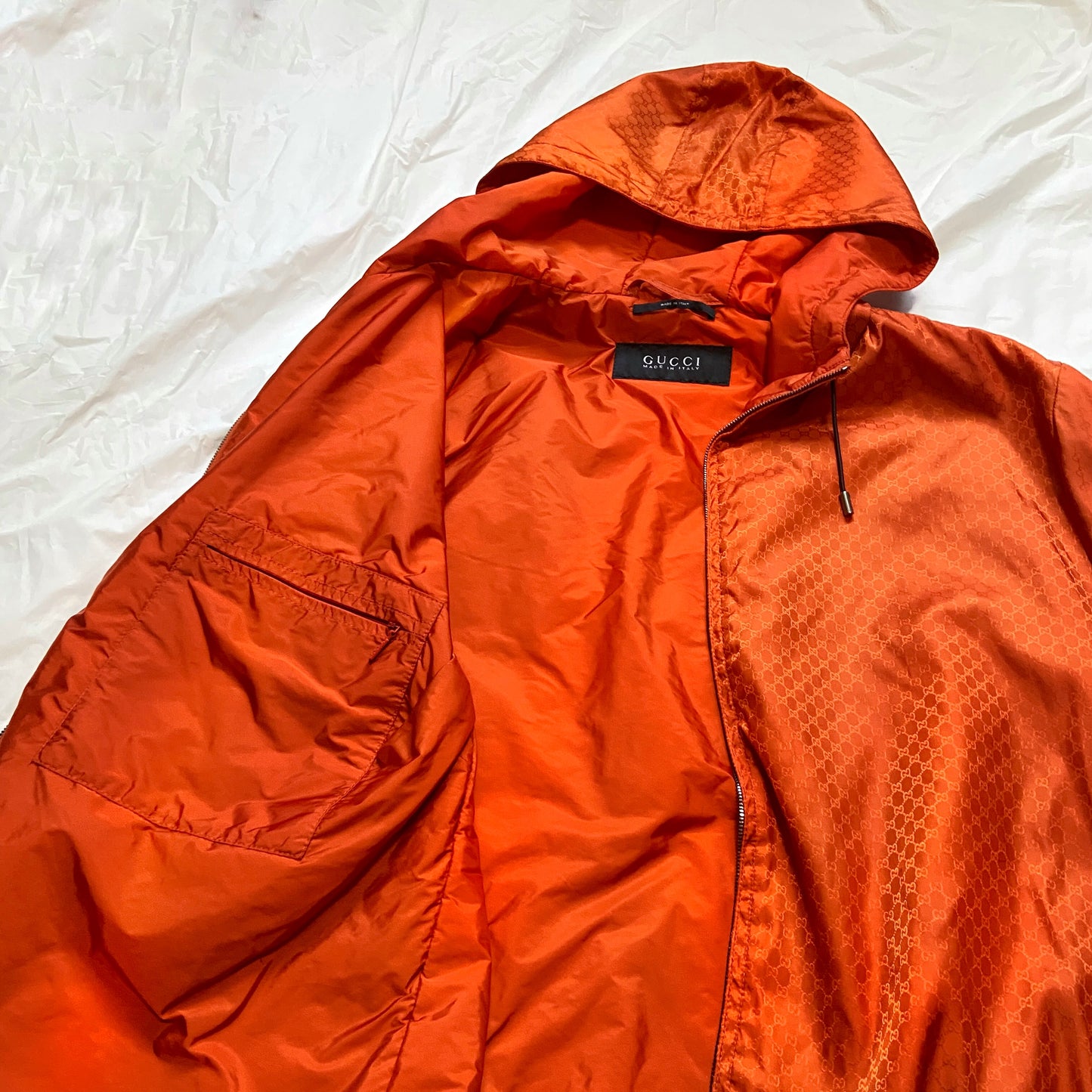 Gucci orange monogram puffer jacket